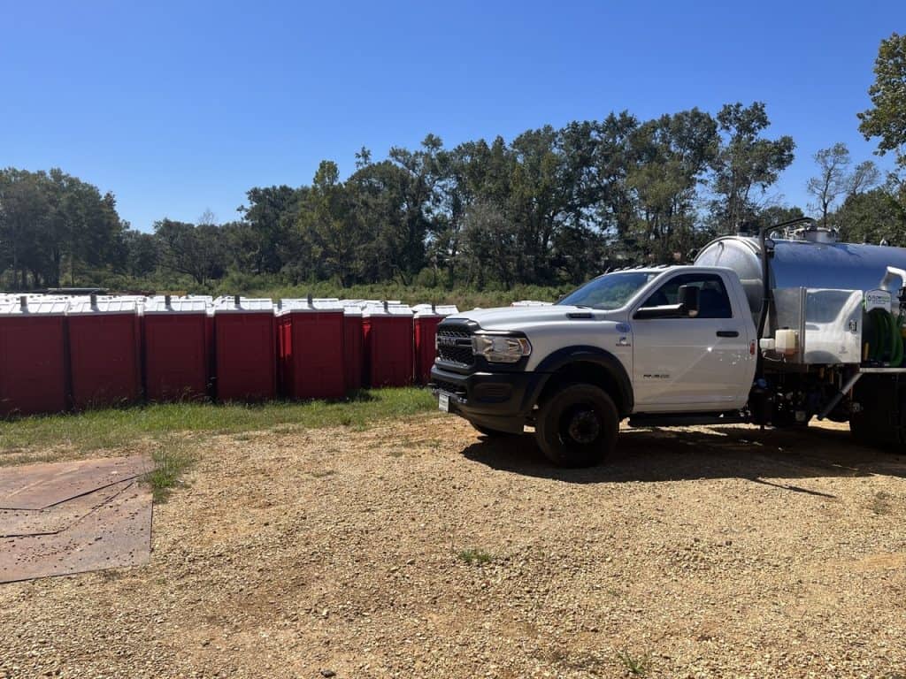 Dynamite Dumpsters Pump Truck and Porta Potties